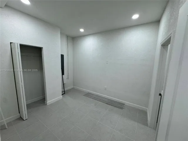 an empty room with closet