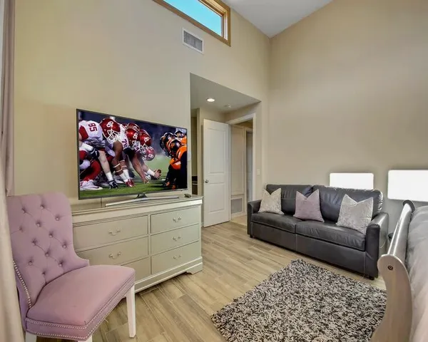 a bathroom with a granite countertop sink a mirror and a