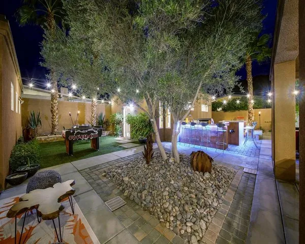 a view of a living room and a balcony