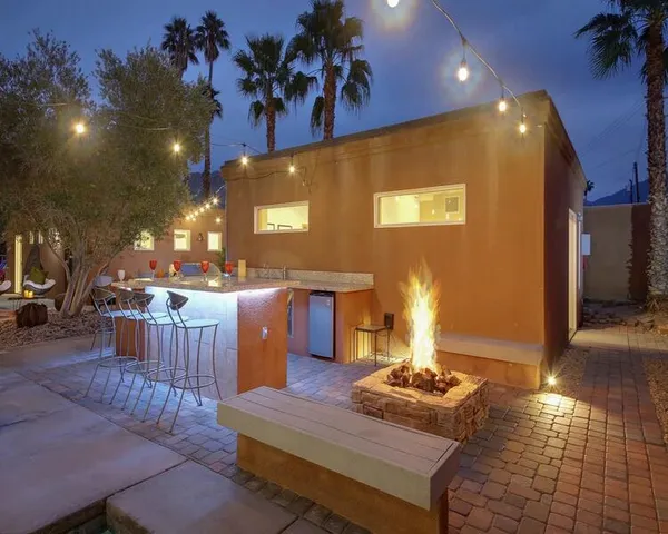 a room with lots of tables and chairs