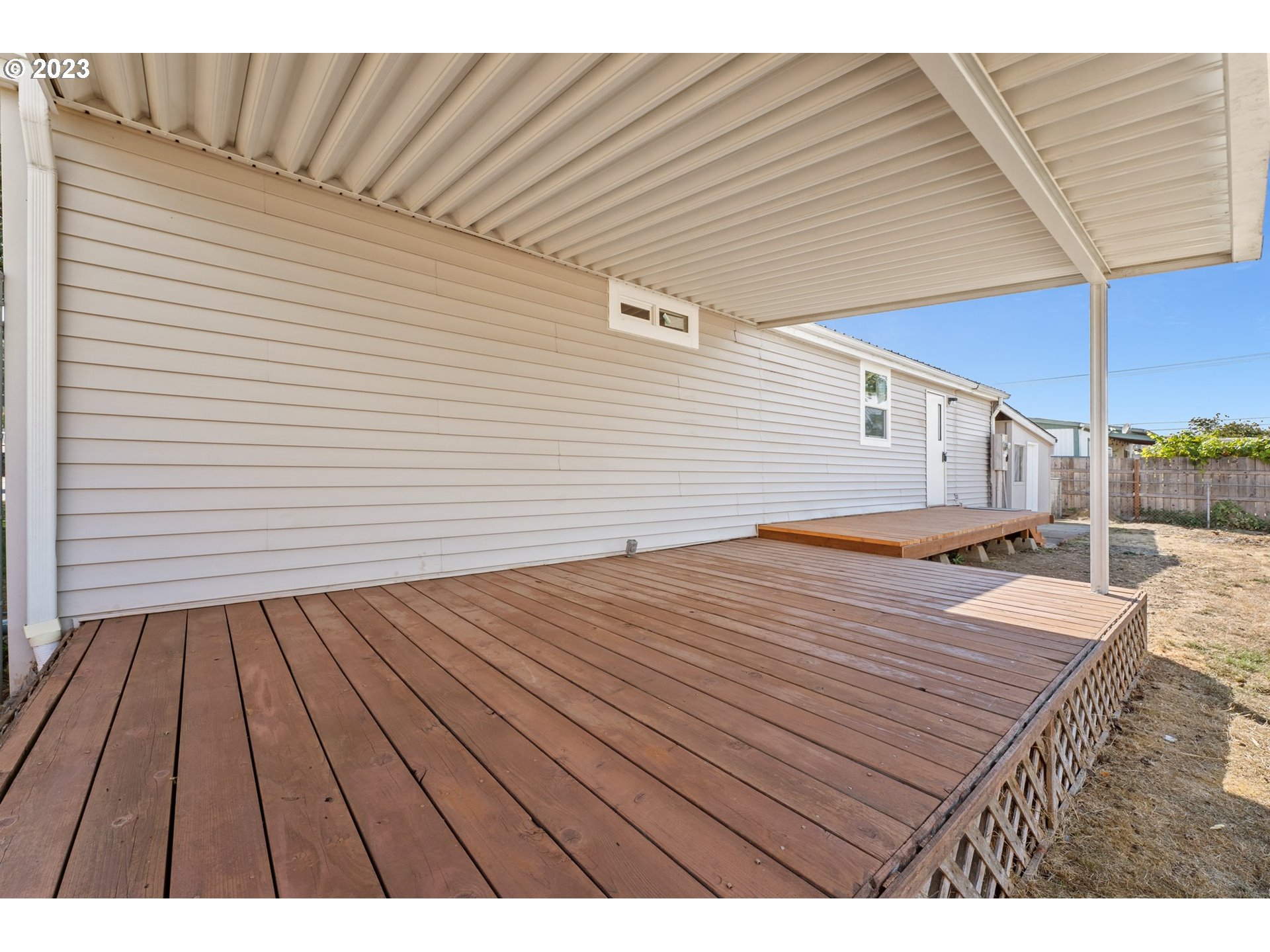3130 U Street Springfield, OR 97477 - Photo 20 of 28 a view of a backyard with wooden floor
