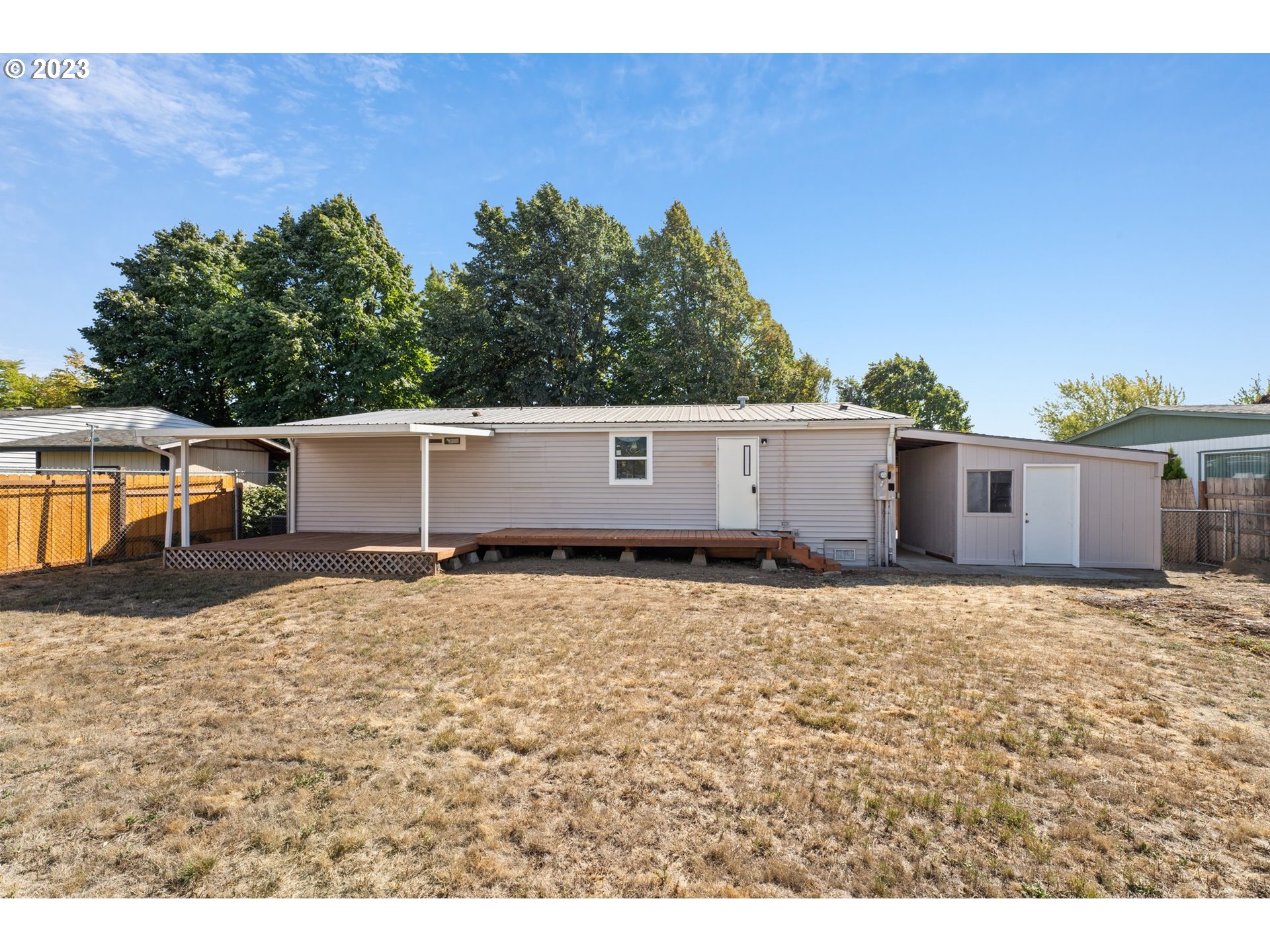 3130 U Street Springfield, OR 97477 - Photo 22 of 28 a view of a house with a yard