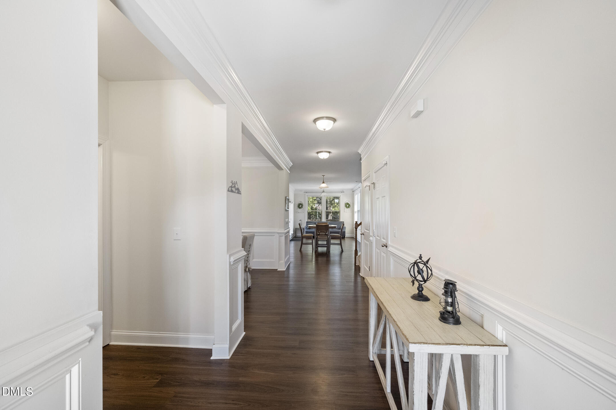 3541 Fairstone Road Wake Forest, NC 27587 - Photo 3 of 39 a hallway with wooden floor and furniture