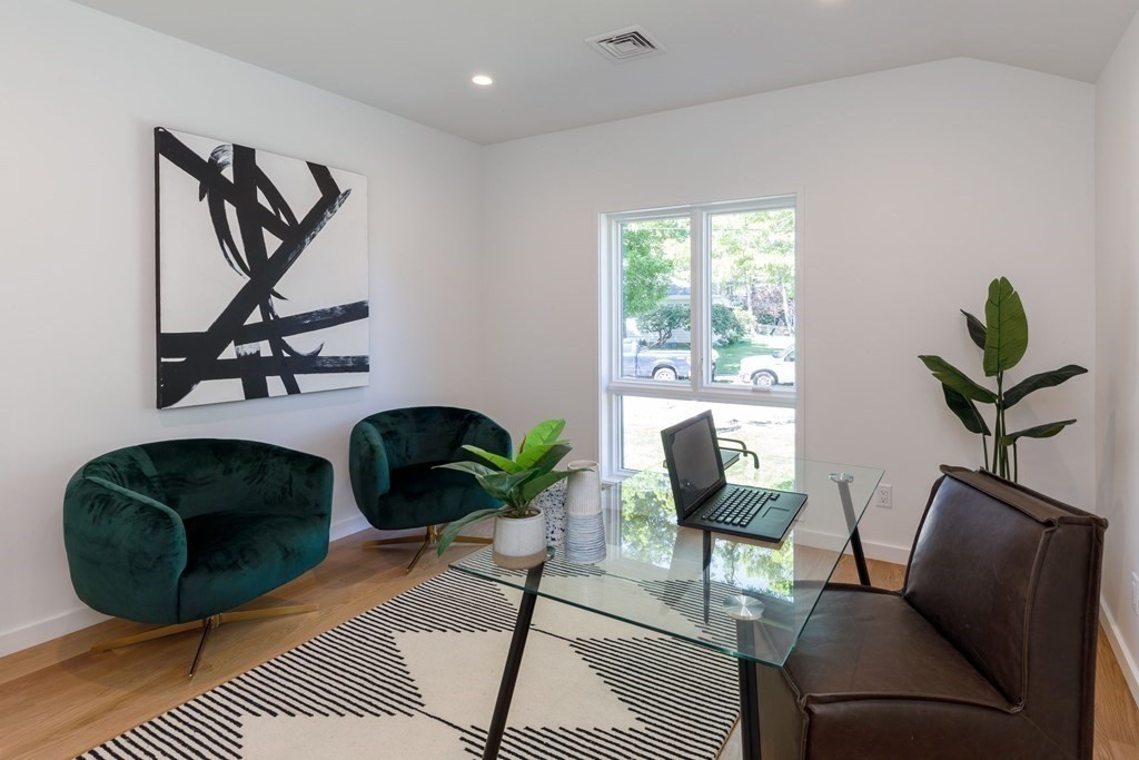 43 Ruane Road Newton, MA 02465 - Photo 16 of 24 a living room with furniture rug and window