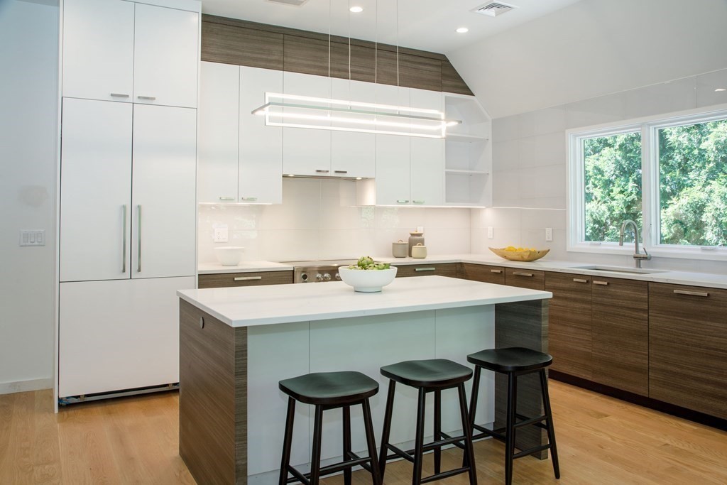 43 Ruane Road Newton, MA 02465 - Photo 5 of 24 a kitchen with a sink cabinets and window
