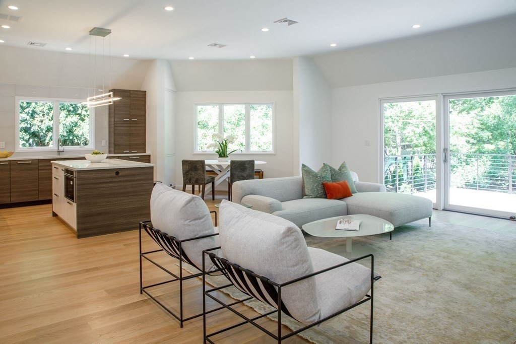 43 Ruane Road Newton, MA 02465 - Photo 6 of 24 a living room with furniture and a large window