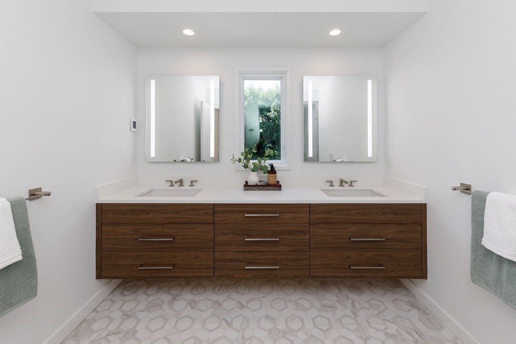 43 Ruane Road Newton, MA 02465 - Photo 10 of 24 a bathroom with a sink vanity and mirror