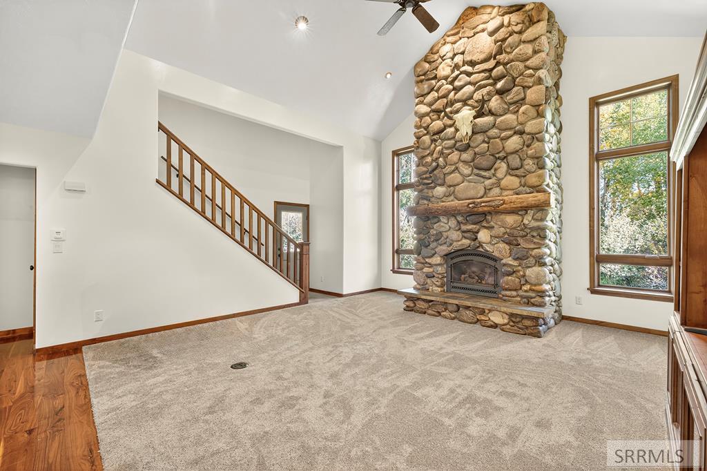 8640 South 500 West Victor, ID 83455 - Photo 28 of 74 Floor to Ceiling River Rock Fireplace in Living Ro
