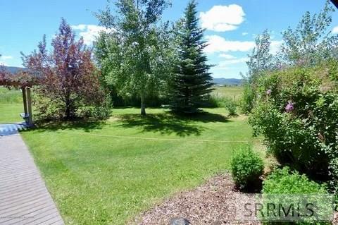 8640 South 500 West Victor, ID 83455 - Photo 68 of 74 Arbor and Walkway to Entry