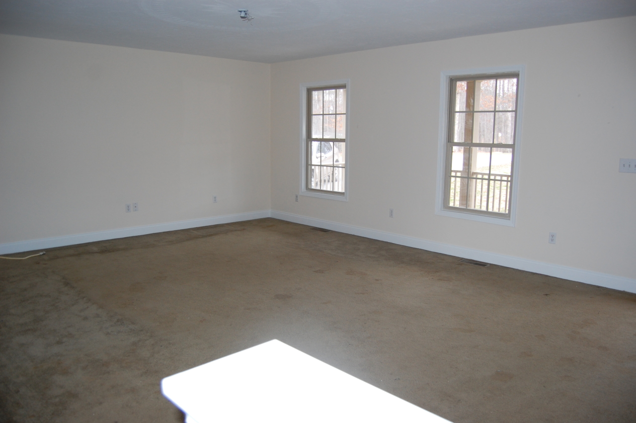 2057 Morgans Mill Road Goodview, VA 24095 - Photo 17 of 18 an empty room with windows