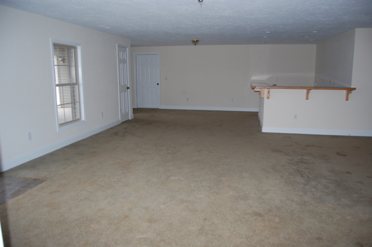 2057 Morgans Mill Road Goodview, VA 24095 - Photo 9 of 18 an empty room with windows