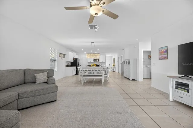 a living room with furniture and a couch