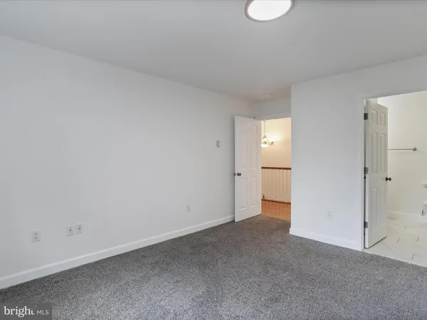 a view of a house with backyard porch and sitting area