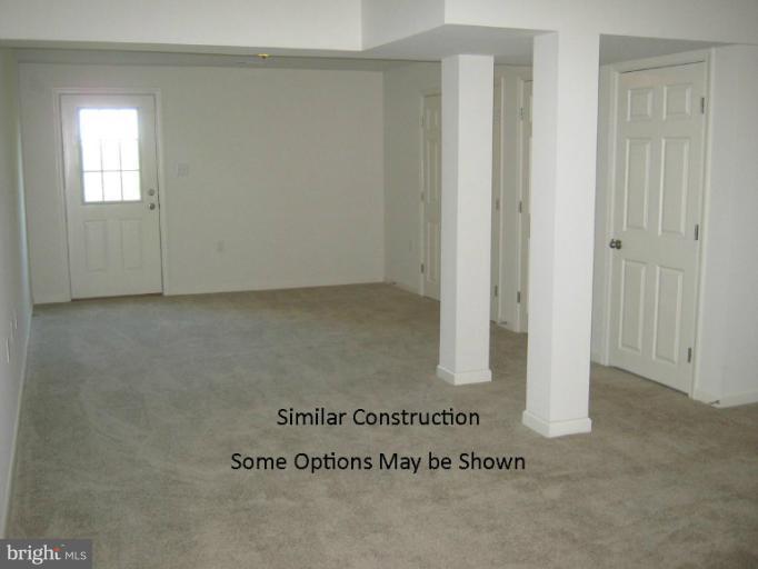 72 Baltic Lane Ranson, WV 25438 - Photo 14 of 17 an empty room with windows