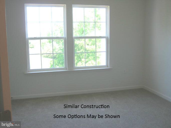 72 Baltic Lane Ranson, WV 25438 - Photo 10 of 17 an empty room with a window