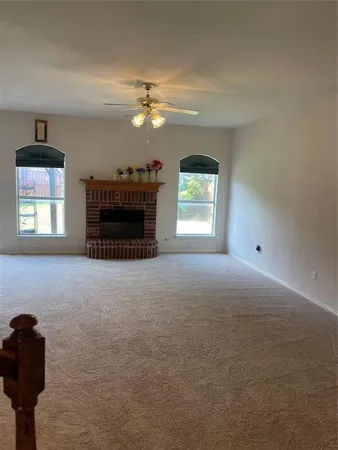 a view of a workspace with furniture