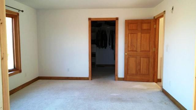 1077 Rock Church Road Dickson, TN 37055 - Photo 14 of 17 MASTER BEDROOM WITH THE HUGE WALK IN CLOSET AND SEPARATE SHOE AREA