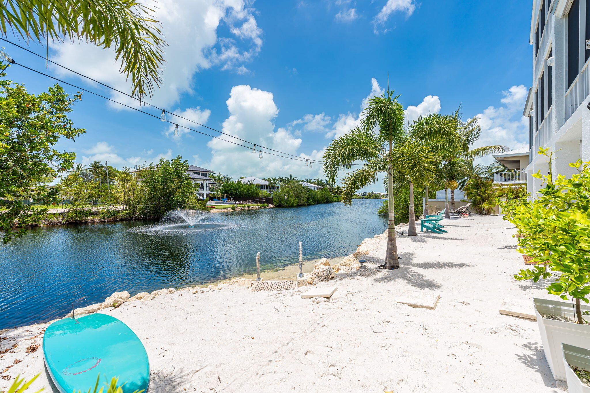24 Mutiny Place Key Largo, FL 33037 - Photo 44 of 69 a view of a lake with a house in the background