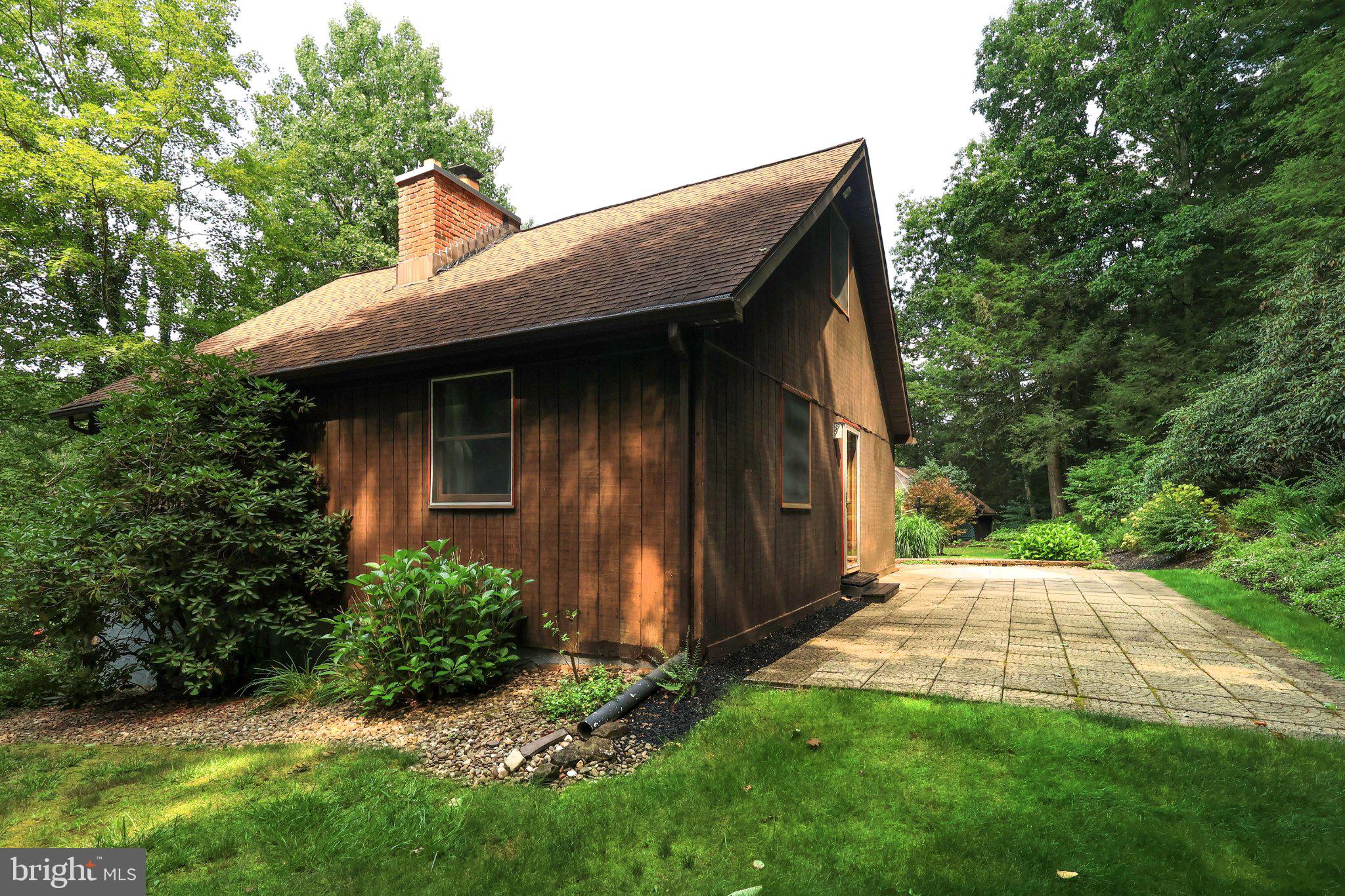 313 Jack Straw Road Julian, PA 16844 - Photo 52 of 69 Charming home nestled in lush greenery.