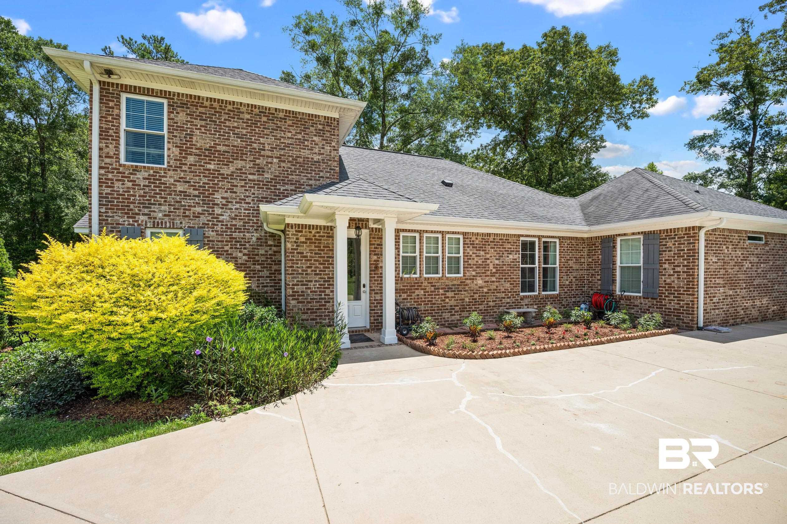 9060 Bromley Road Bay Minette, AL 36507 - Photo 54 of 63 View of front of house with brick siding and roof with shingles