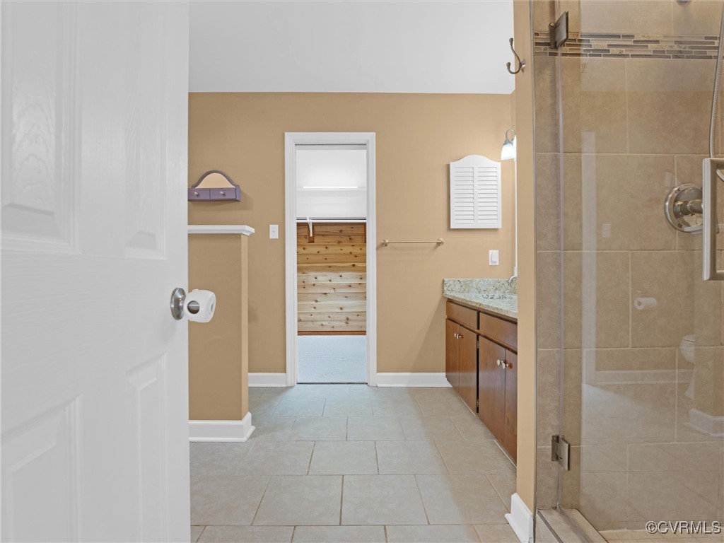 14005 Fortunes Ridge Court Midlothian, VA 23112 - Photo 24 of 50 Bathroom with vanity, a shower with shower door, a