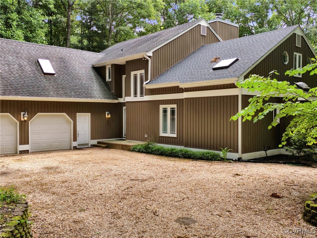 View of front of home featuring a garage