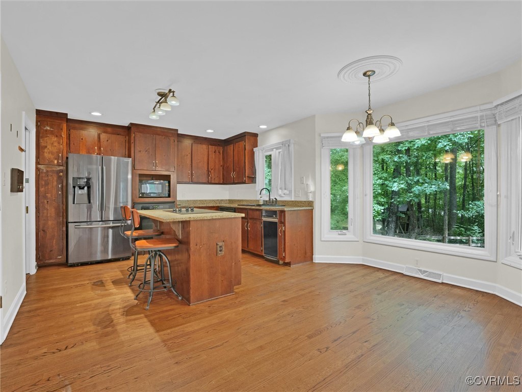 14005 Fortunes Ridge Court Midlothian, VA 23112 - Photo 38 of 50 Kitchen featuring stainless steel fridge, decorati