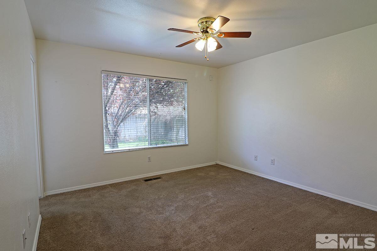 4652 Goodwin Road Sparks, NV 89436 - Photo 16 of 20 an empty room with a window