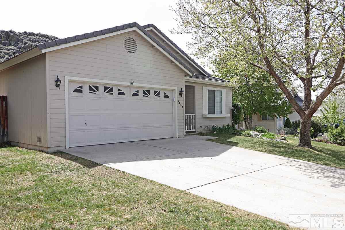 4652 Goodwin Road Sparks, NV 89436 - Photo 3 of 20 a front view of house with yard
