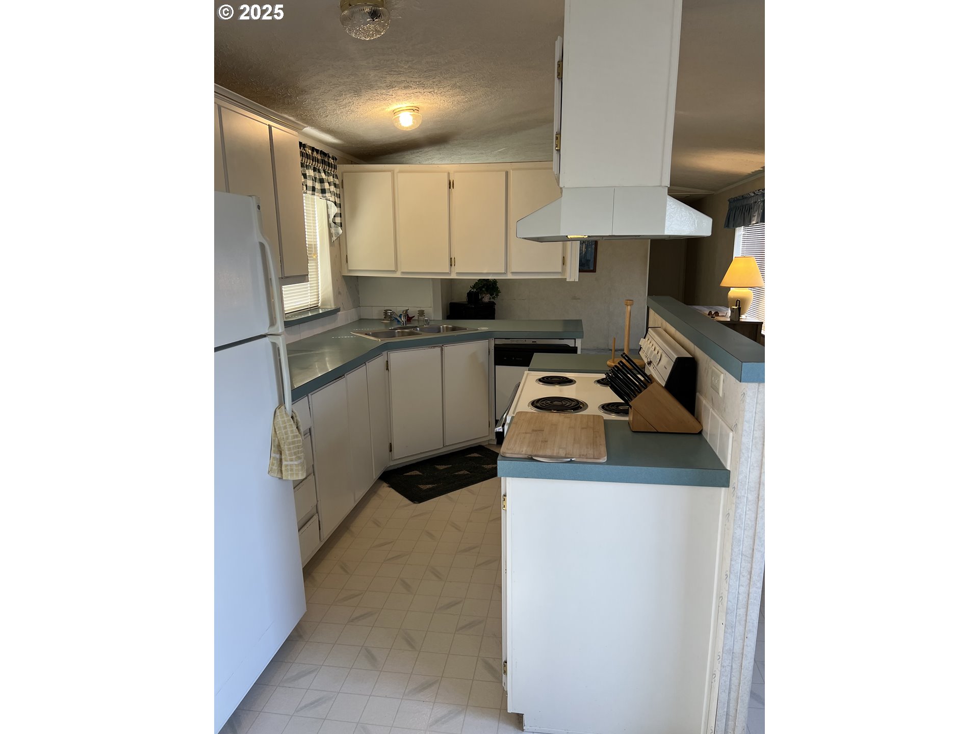 2801 Southwest Hautama Road Pendleton, OR 97801 - Photo 6 of 11 a kitchen with a sink cabinets and a window