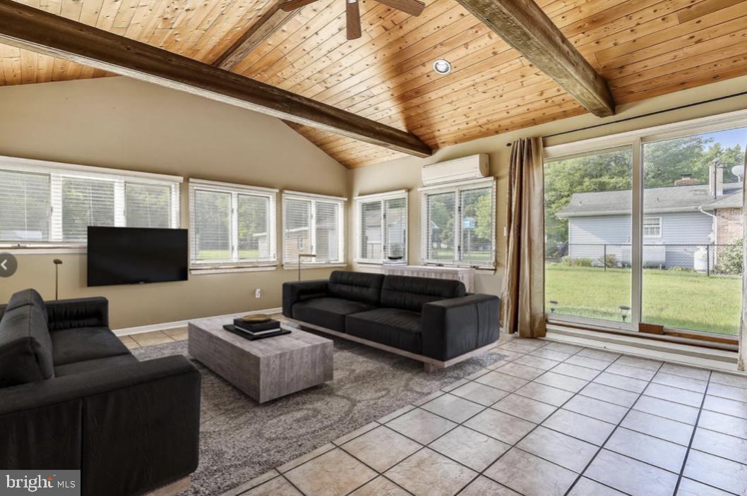 8107 Main Creek Road Pasadena, MD 21122 - Photo 55 of 71 Large Sun/Family Room w/ exposed beams