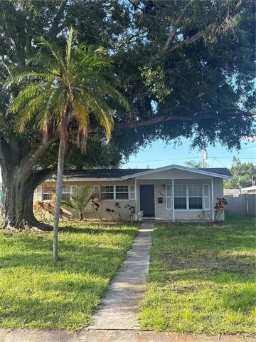 front view of a house with a yard