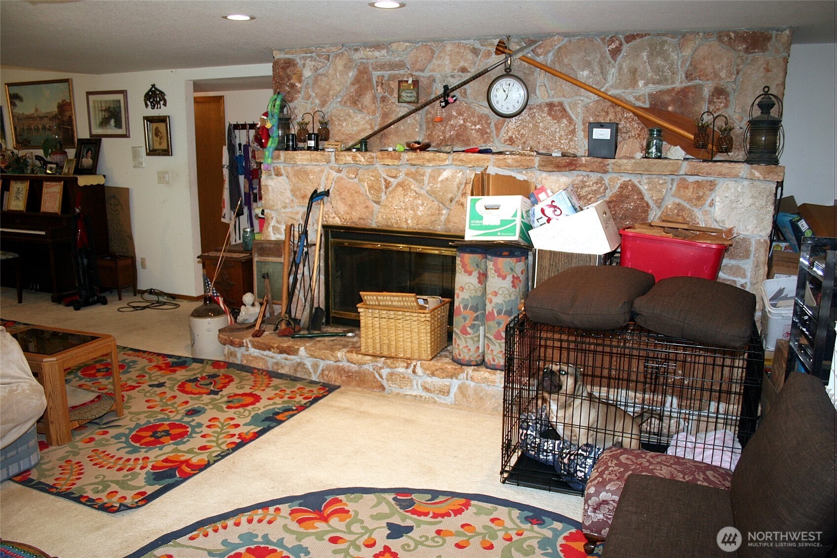 30726 43rd Avenue Southwest Federal Way, WA 98023 - Photo 27 of 39 a living room with furniture a rug and a chandelier