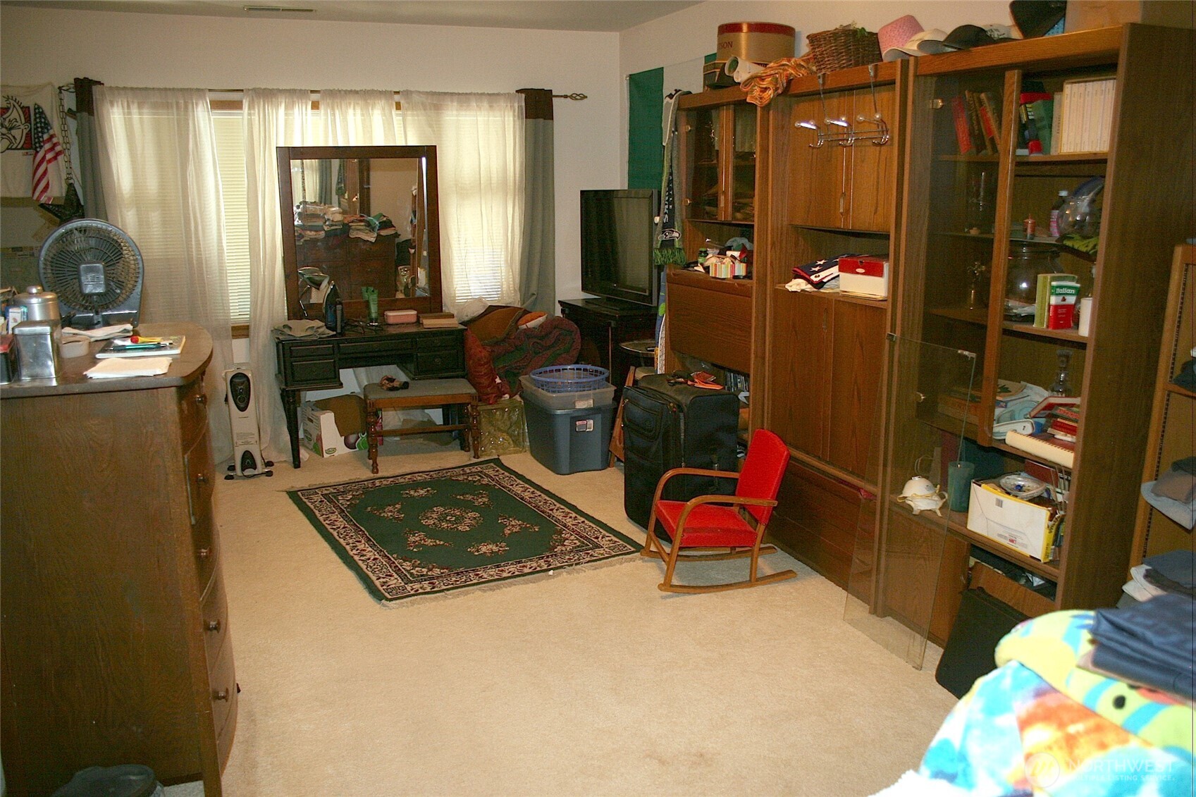 30726 43rd Avenue Southwest Federal Way, WA 98023 - Photo 28 of 39 a room with furniture a rug and a walk in closet