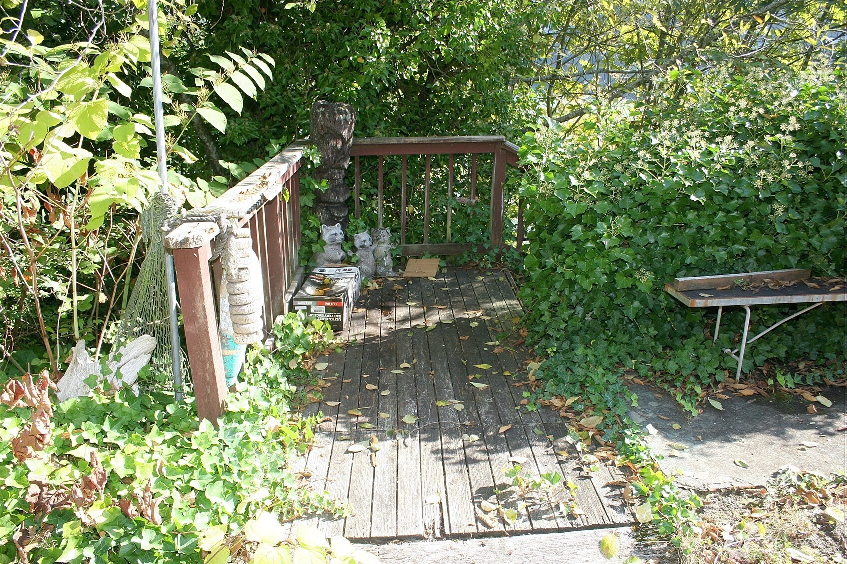 30726 43rd Avenue Southwest Federal Way, WA 98023 - Photo 35 of 39 a view of a chair and table in the backyard