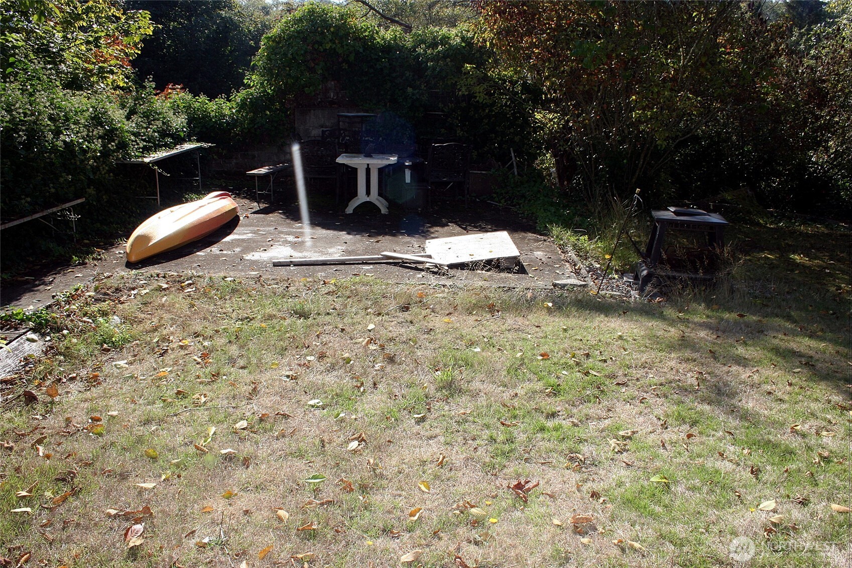 30726 43rd Avenue Southwest Federal Way, WA 98023 - Photo 36 of 39 a backyard of a house with table and chairs