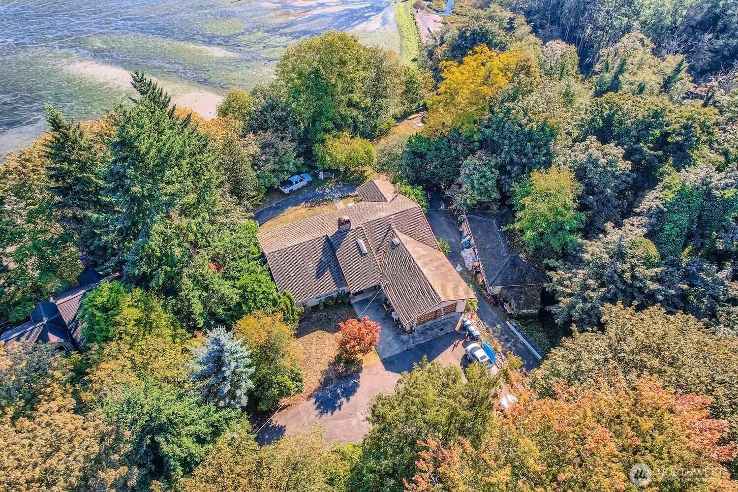 30726 43rd Avenue Southwest Federal Way, WA 98023 - Photo 5 of 39 an aerial view of a house with a yard and trees