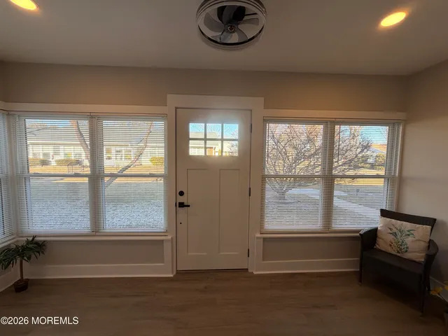 a view of livingroom with furniture and windows