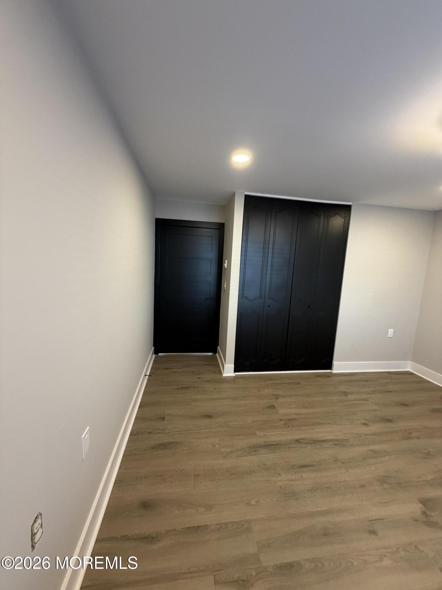 833 B Inverness Court, Unit B Lakewood, NJ 08701 - Photo 30 of 43 a view of an empty room