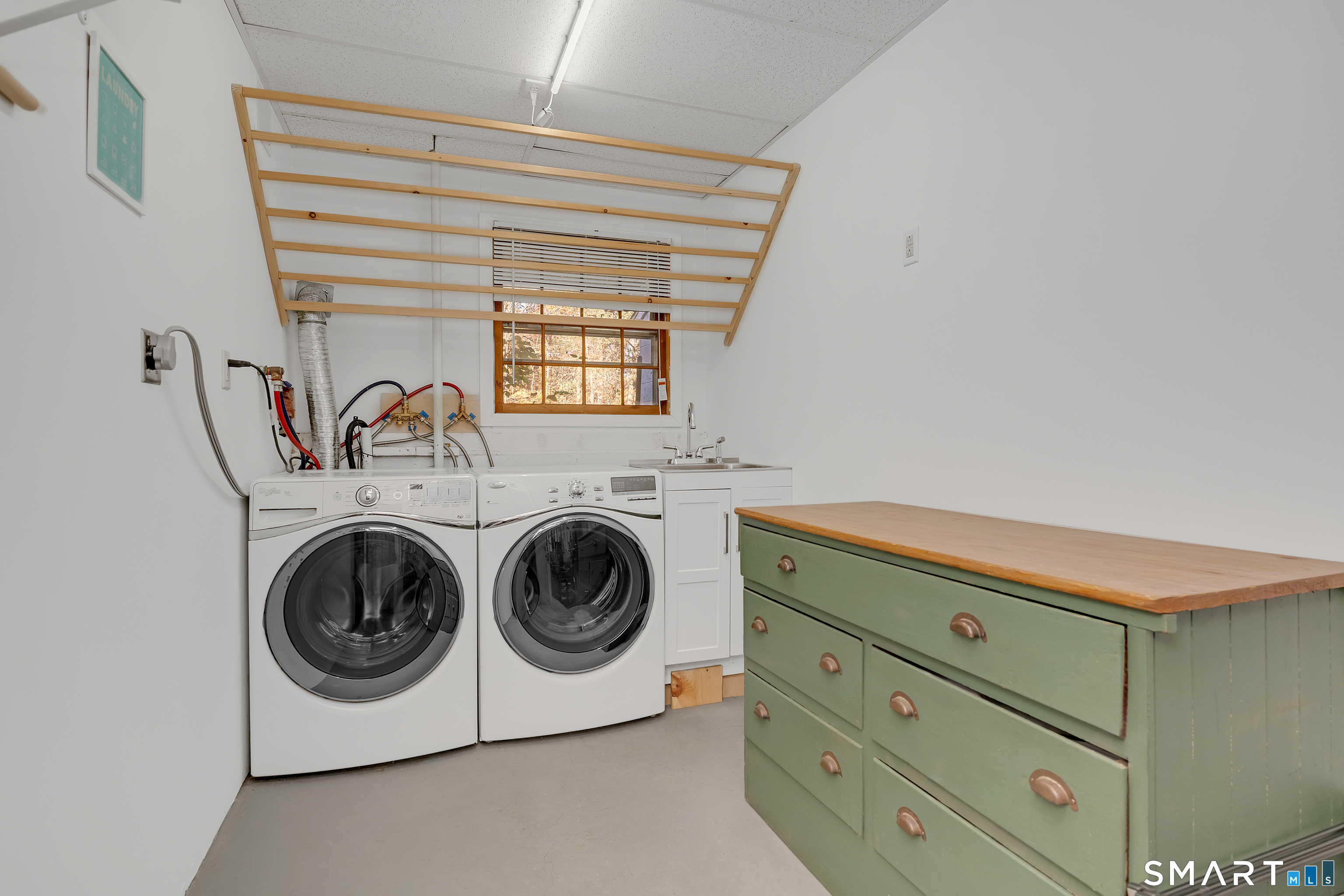 16 Marion Road Bethany, CT 06524 - Photo 27 of 40 a utility room with dryer and washer