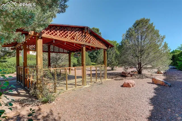 a view of a chairs and tables in the patio