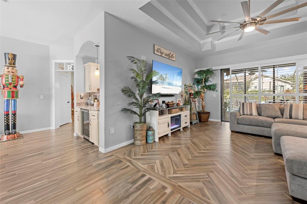 14173 Pullman Drive Spring Hill, FL 34609 - Photo 22 of 77 a living room with furniture and a flat screen tv