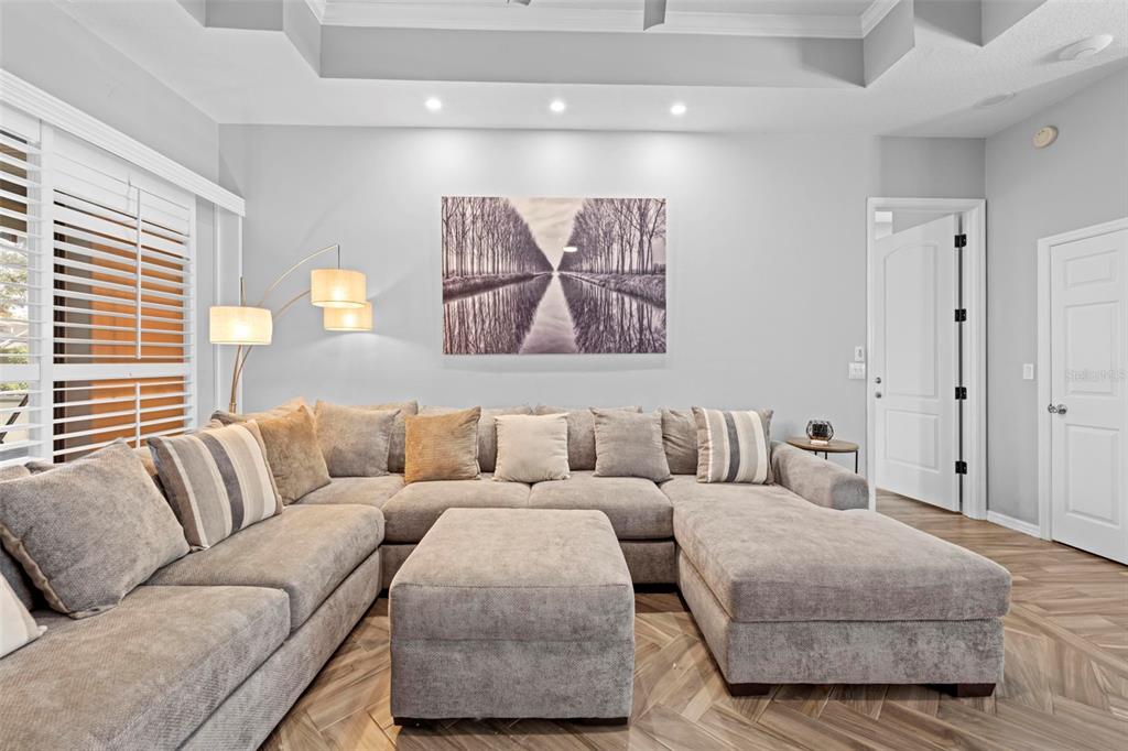 14173 Pullman Drive Spring Hill, FL 34609 - Photo 25 of 77 a living room with furniture and a large window