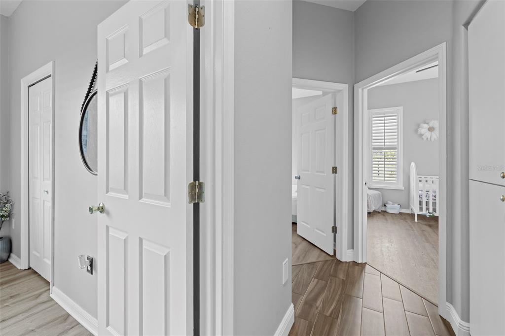 14173 Pullman Drive Spring Hill, FL 34609 - Photo 52 of 77 a view of a room with wooden floor and entryway
