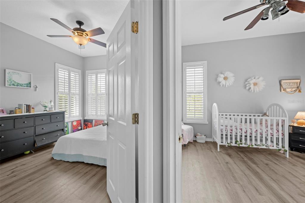 14173 Pullman Drive Spring Hill, FL 34609 - Photo 55 of 77 a bedroom with furniture and a window