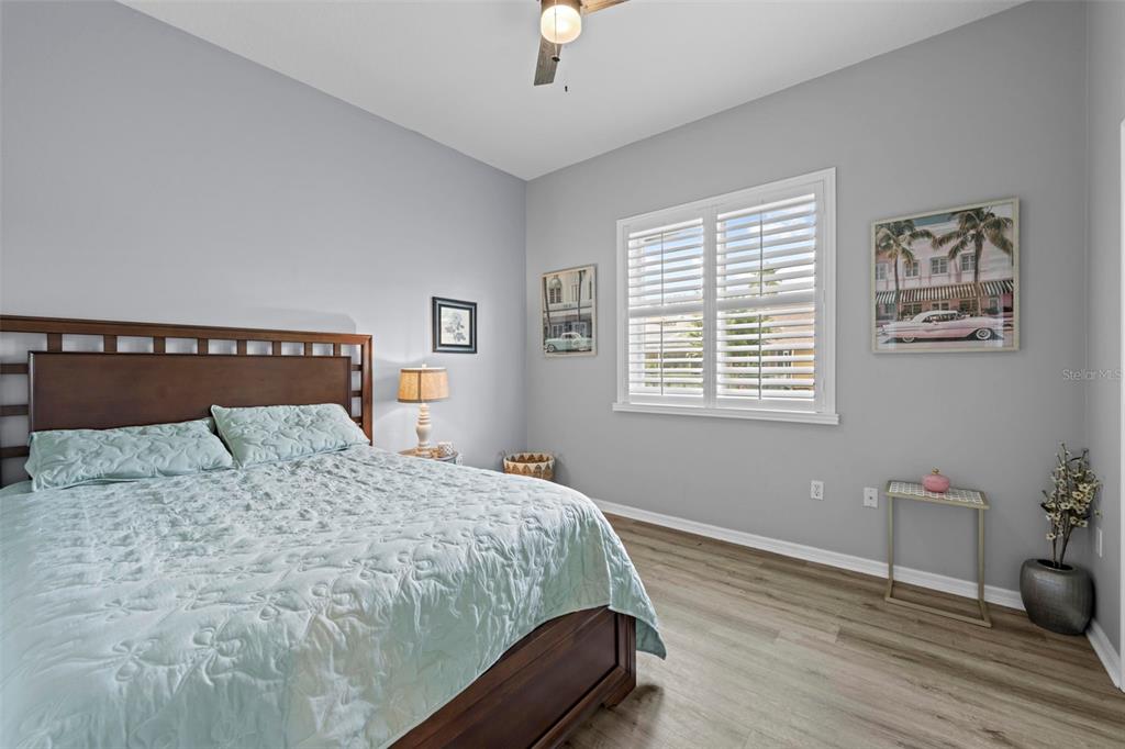 14173 Pullman Drive Spring Hill, FL 34609 - Photo 61 of 77 a bedroom with a bed and a window