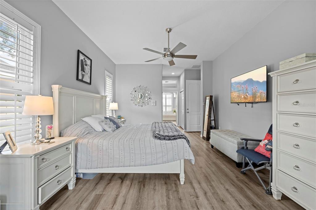 14173 Pullman Drive Spring Hill, FL 34609 - Photo 67 of 77 a bedroom with double bed and a dresser