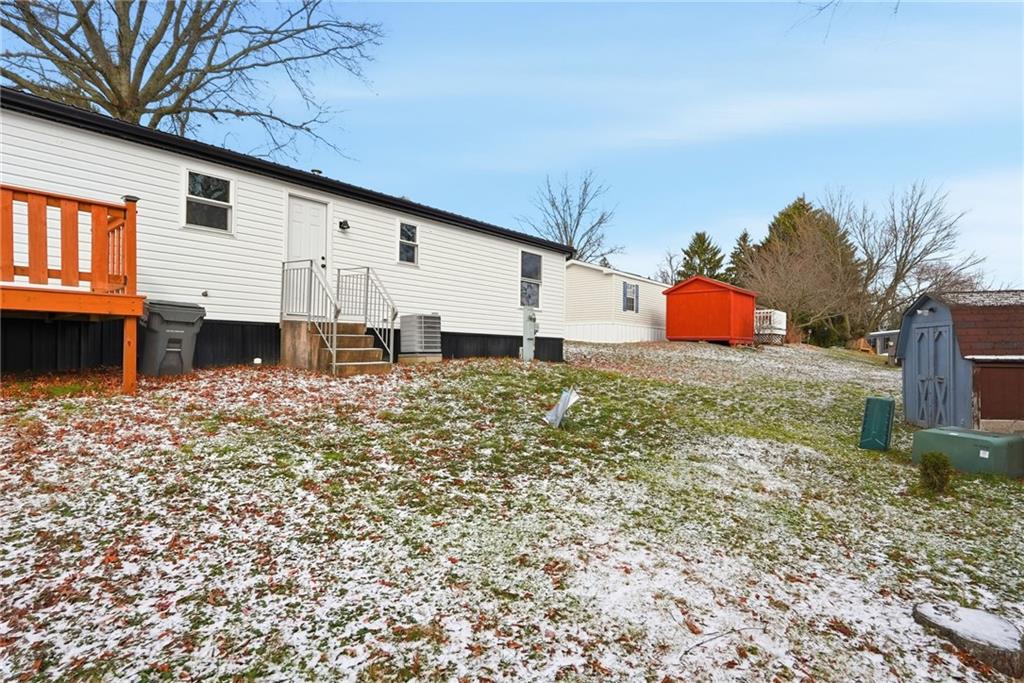 105 York Road Cranberry Township, PA 16066 - Photo 17 of 18 a view of a house with backyard and sitting area