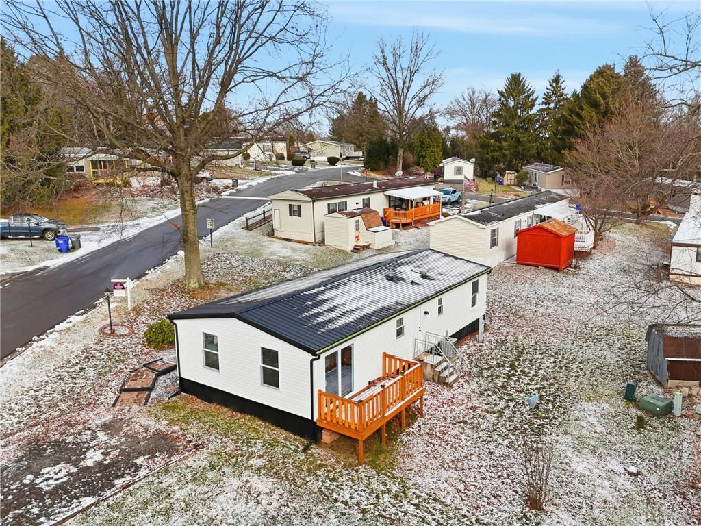 105 York Road Cranberry Township, PA 16066 - Photo 18 of 18 a view of a backyard with chairs and a fire pit