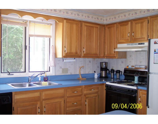 188 New Boston Road Sturbridge, MA 01566 - Photo 3 of 13 a kitchen with stainless steel appliances granite countertop a sink stove and cabinets